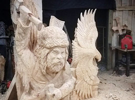 Axe Man and Eagle Chainsaw Carving