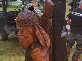 Hunter and Trapper Chainsaw Sculpture