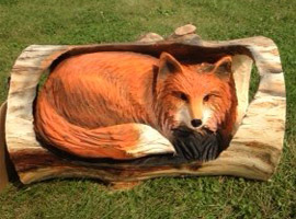 Fox in Log Chainsaw Carving